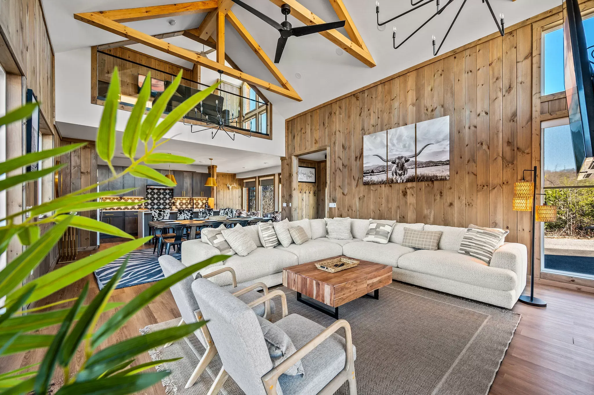 Vaulted great room with mountain-facing windows